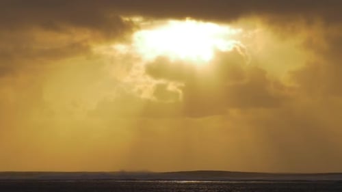 Seascape in warm evening sunlight