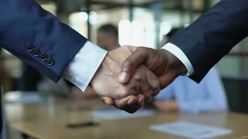 Business Handshake in Modern Corporate Workplace