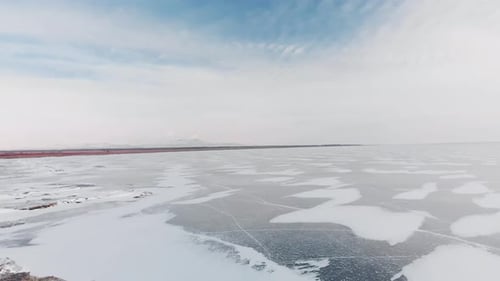 Aerial View Ice Hummock and Cracks at Frozen Lake