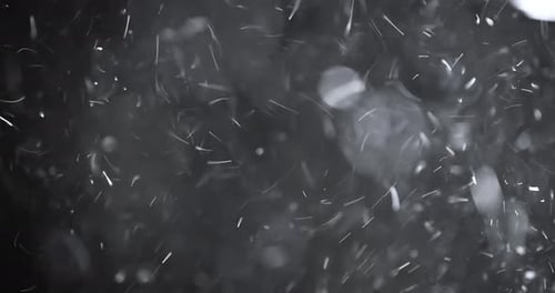 Abstract White Particle Fall with Bokeh Background