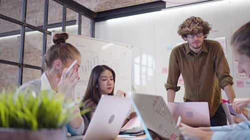Diverse Team Collaborating in Modern Office