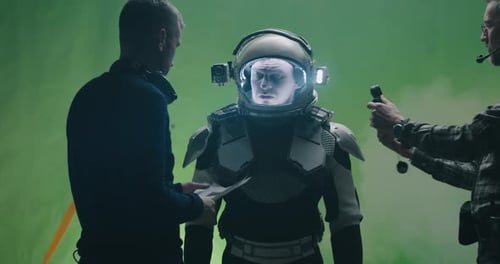 Astronaut Being Filmed in Front of Green Screen