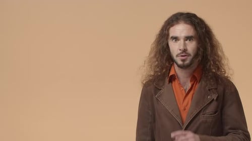 Man with Long Hair Surprised and Shocked