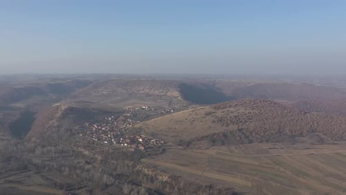 Eastern Serbian landscape with small settlement 4K drone footage