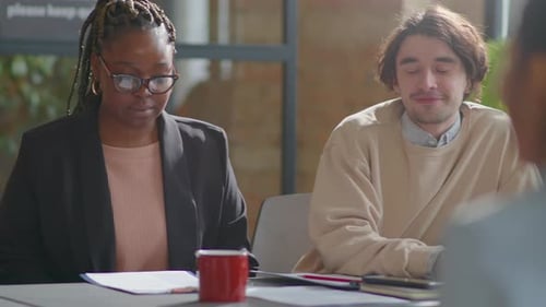 Adults Attending a Job Interview in Office