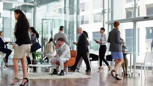 Businesspeople walking in cafeteria