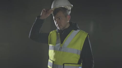 Construction Worker Wearing Hard Hat and Reflective Vest