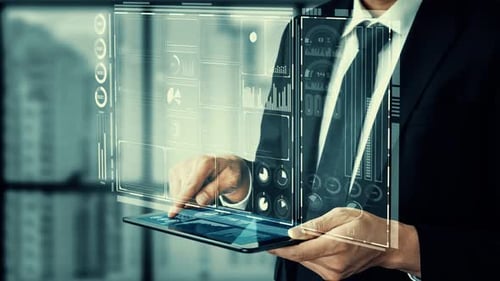 Business Person Using Tablet with Data Interface