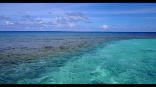 Aerial view travel of relaxing seashore beach trip by aqua blue sea with white sandy background of a
