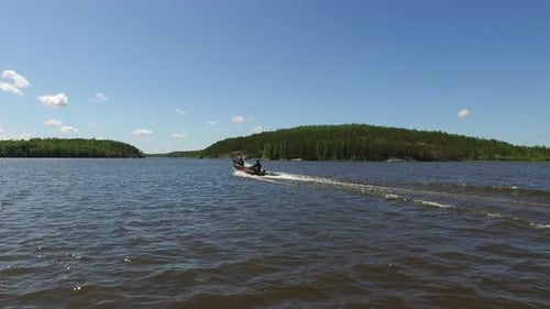 Men navigating on lake