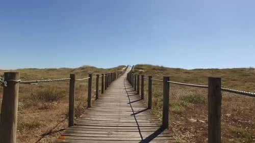 Beach Boardwalk Path Leads to Coastal Escape