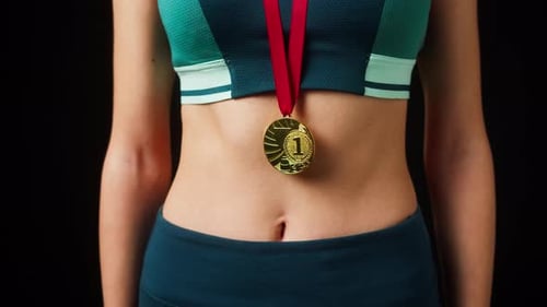 Close Up of Athlete with Gold Medal