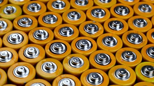 Macro Shot of Yellow Batteries Lying Side by Side