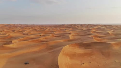 Aerial view of red Desert Safari with sand dune in Dubai City, United Arab Emirates or UAE