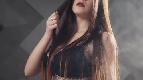 Woman Posing Fashionably with a Modern Aesthetic