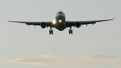 Modern Airplane Landing at Airport