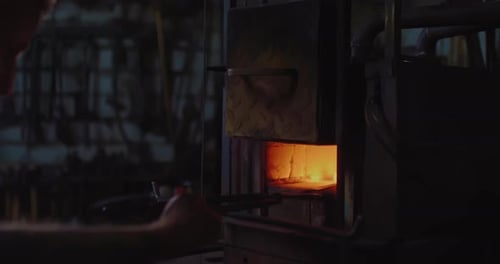 Blacksmith Take Out Red Hot Billet of Knife From Furnace in Forge Close Up View Prores