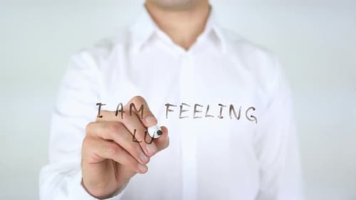 Man Writing Feeling Lucky On Glass Screen