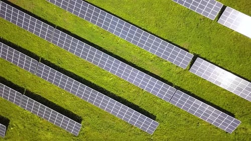 Aerial view of solar power plant. Electric panels for producing clean ecologic energy.