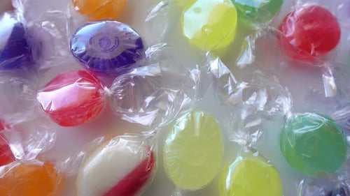 Colorful Hard Candies Wrapped in Clear Plastic