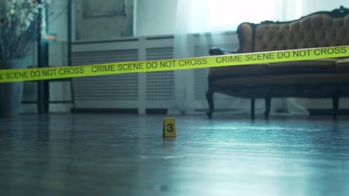 Crime Scene Indoors with Tape and Evidence Markers