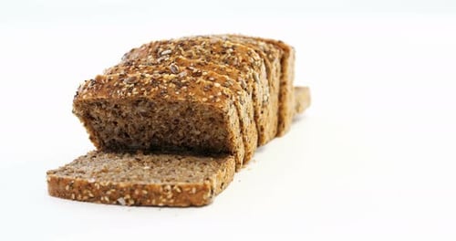 Loaf of Whole Wheat Bread with Slices Cut