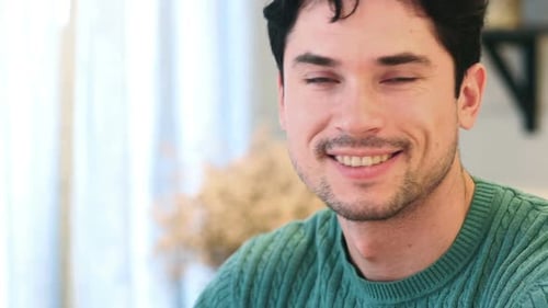 Close Up of Thumbs Up By Young AfroAmerican Man in Office