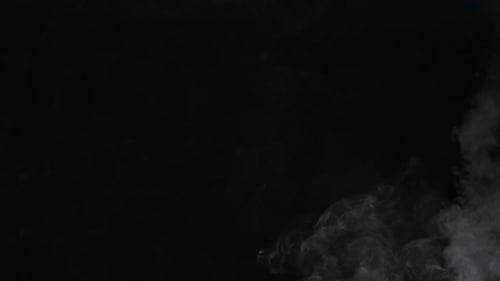 Atmospheric White Smoke Rising on Black Background