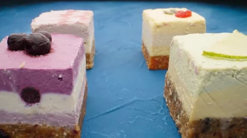 Delicious Layered Cakes with Garnish on Display