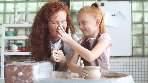 Pottery Class Workshop. Clay Shaping on Potter's Wheel and Firing.