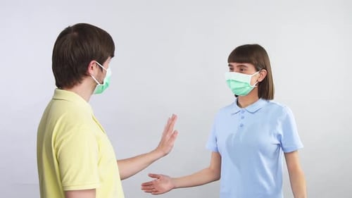 Man and Woman Promote Safe Social Distancing