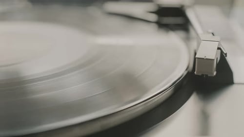 Vintage Record Player Spins Black Vinyl Record