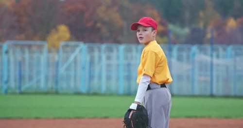 Baseball at School the Pitcher Pitches Fastball Toward Batter Young Boy Throwing the Ball Slow