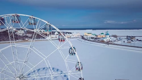 Ferris Wheel And View Of The Church In Cheboksary