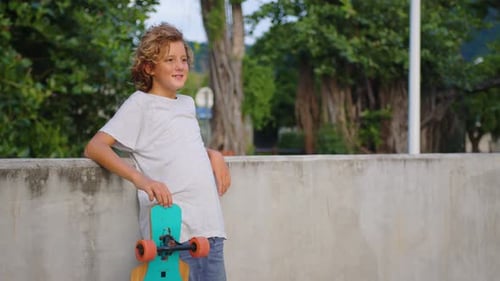 Thoughtful Skater Guy on Urban Background