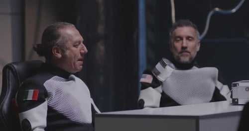 Scientists in Space Suits Discussing Food