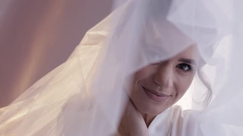 Elegant Woman in Bridal Veil Smiling