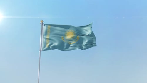 Kazakhstan National Flag Waving Realistically Against Blue Sky
