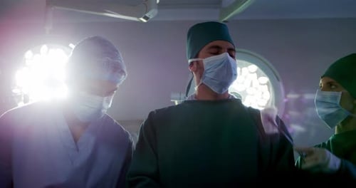 Surgeons Working in Hospital Operating Room