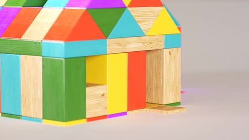 Casa colorida hecha de bloques de madera. Juego de construcción preescolar. Educación.