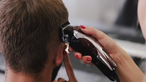 Man Gets Haircut With Electric Hair Clipper