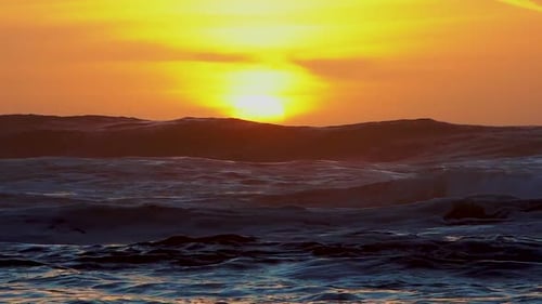 Golden Sunset Over the Ocean Waves