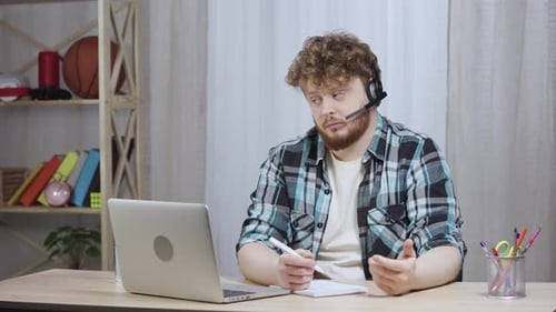 Young Adult on Video Conference Call at Home