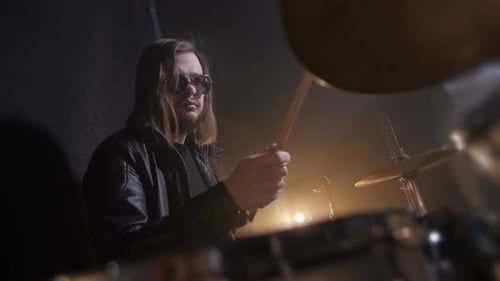 Skillful Drummer Playing on Drums in Record Studio