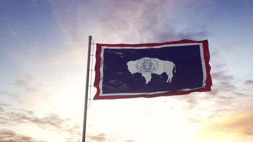 Wyoming State Flag Waving at Sunset
