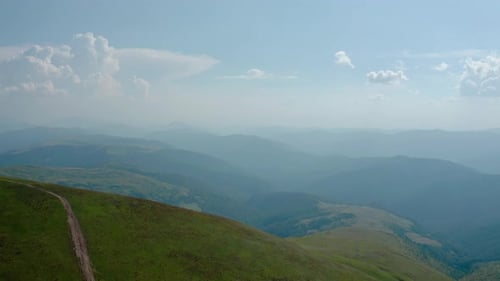 Aerial Drone View. Green Mountains Without Trees, on a Background of Blue Sky Svydovets Dragobrat