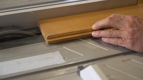 Elderly Arm Woodworker Working