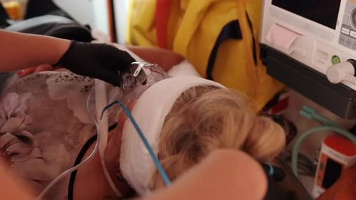 Patient in Hospital Bed with Oxygen Mask Doctor in Protective Gear Gloves Put Oxygen Mask Patient