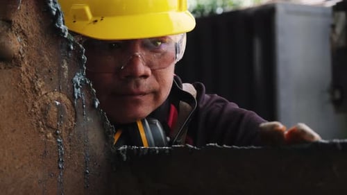 Construction Worker Wearing Safety Gear at Workplace