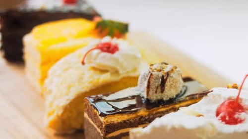 Colorful Cake Slice Assortment on Display